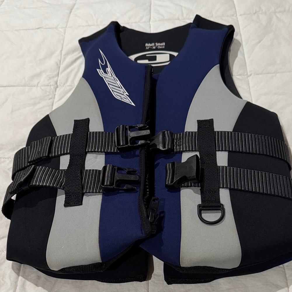 NWOT. Blue Black Gray Adult  Life Vest